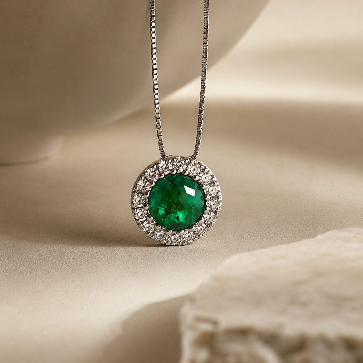 Aura emerald halo pendant necklace