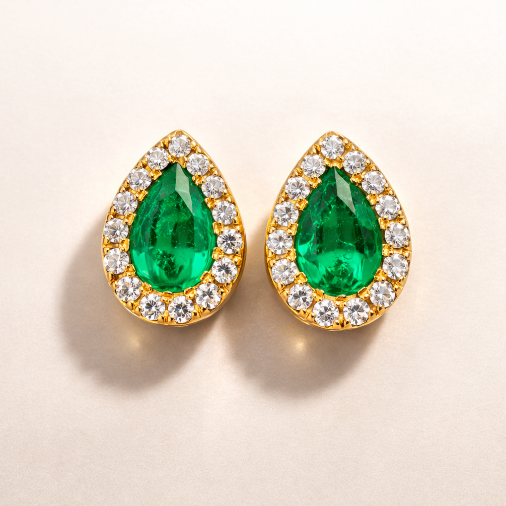 Aurora colombian emerald halo stud earrings